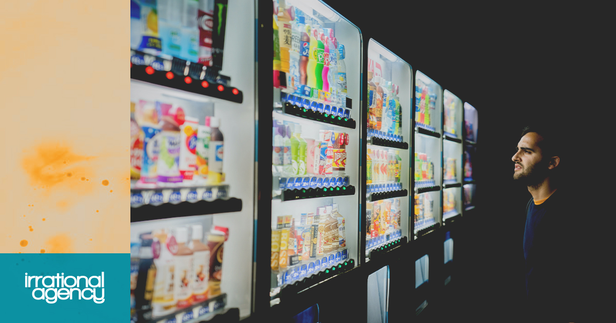 Man looking at vending machines